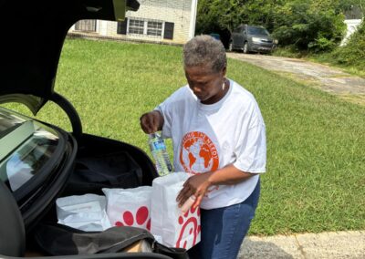 Serving the needy Globally Inc. Volunteers getting ready to feed the homeless in Downtown Atlanta ,Georgia on Labor Day 09/07/2026.